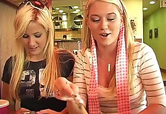 Two pleasurable blondes make some naughty things in a cafe