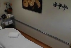 Hot Asian masseuse gives a hidden camera rub and tug