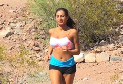 Big titty brunette babe jogging with her tits out