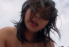 Busty salacious brunette Asian babe Megumi Haruka received hardcore doggy style fuck on beach