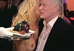 Pammy Anderson giving HH a treat