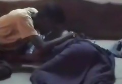 Sex starving desi feels up Indian girl while she sleeps tight