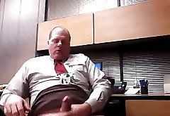 Older executive dad jacking off at the office