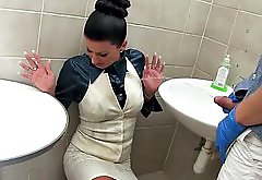 Urinal slut gets peed on