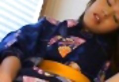 Arika Takarano fucks with dildo under kimono