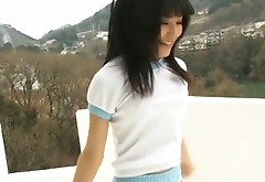 Japanese cutie Yuri Hamada strokes her twat with vibrator