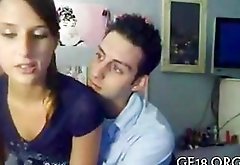 Cute gal sucking off her aroused bf on webcam