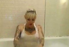 Tattooed Blonde In The Bath Tub