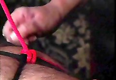 Horny guy in bondage action with an asian