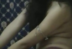Mouth-watering Indian girl is posing on cam wearing traditional dress
