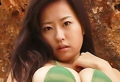 Bootylicious Asian girlie Hitomi Kitamura demonstrates her big boobs
