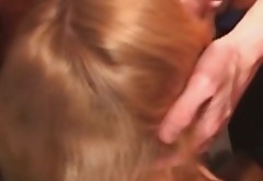 Perverse blond slut gives a head in gangbang sex orgy