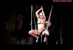 Blonde Girl Hanging In Bondage Getting Her Pussy Fucked With Dildo Stimulated With Vibrator By Master In The Dungeon
