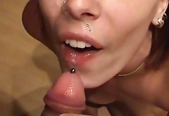 pierced cock ejaculates on pierced tongue