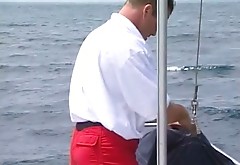 Lifeguard gets his throbbing cock sucked on a boat