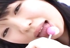 Cheesecake Japanese college chic Gekichaku Idol sucks lollypop wearing bikini